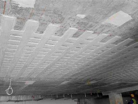 Durability of CFRP Strengthening: Environmental Aging and Long-Term Performance
