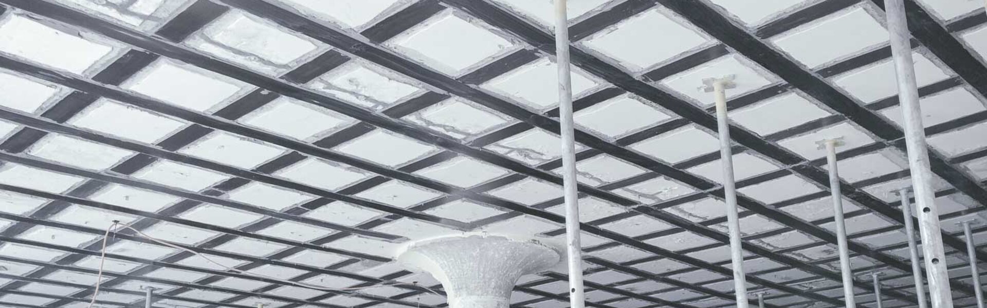 ACI 440 vs. FIB Bulletin 14: A Comparative Guide to CFRP Design Codes
